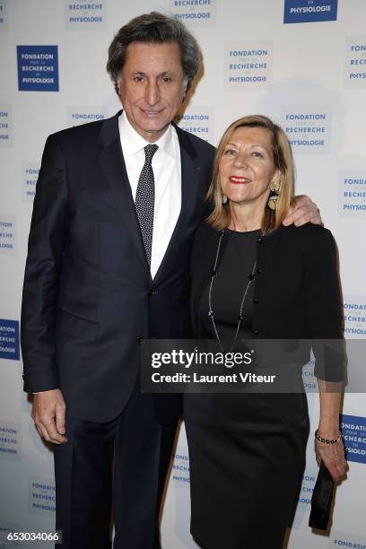 Patrick de Carolis and Carol-Anne Hartpence attend "La Recherche en Physiologie" Charity Gala at Four Seasons Hotel George V on March 13, 2017 in...