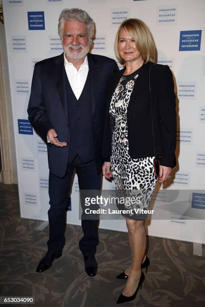 Humorist Roland Magdane and Marie-Claude Magdane attend "La Recherche en Physiologie" Charity Gala at Four Seasons Hotel George V on March 13, 2017...