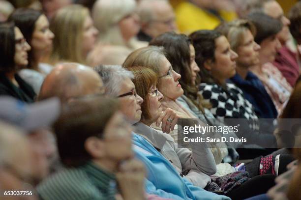 Constituents to Rep. David Price listen during a town hall meeting at Broughton High School on March 13, 2017 in Raleigh, North Carolina....
