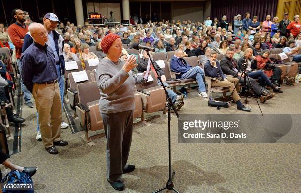 Constituent asks Rep. David Price a question during a town hall meeting at Broughton High School on March 13, 2017 in Raleigh, North Carolina....