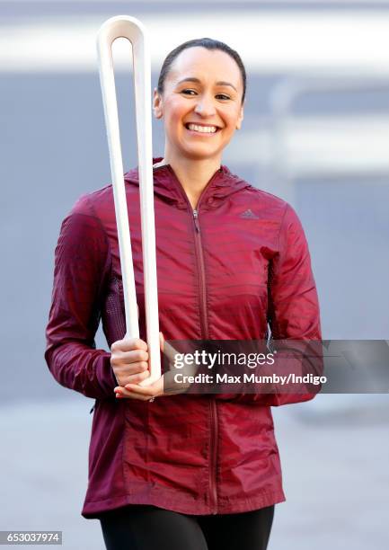 Dame Jessica Ennis-Hill carries The Queen's Baton as she attends the Commonwealth Day Service at Westminster Abbey on March 13, 2017 in London,...