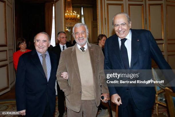 Claude Brasseur, Jean-Paul Belmondo and Pierre Benichou attend Claude Brasseur is elevated to the rank of "Officier de la Legion d'Honneur" at Elysee...