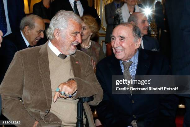 Jean-Paul Belmondo and Claude Brasseur attend Claude Brasseur is elevated to the rank of "Officier de la Legion d'Honneur" at Elysee Palace on March...