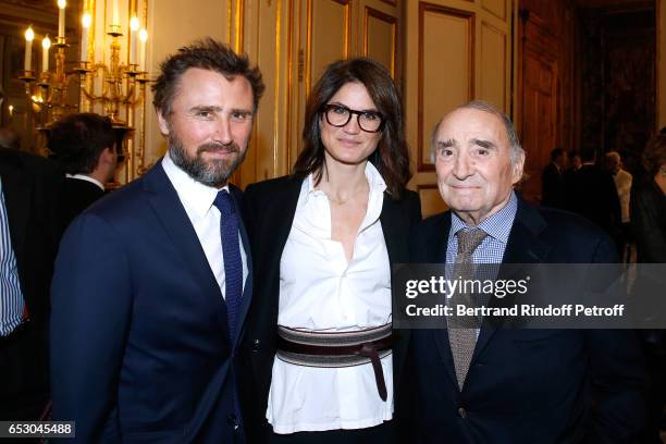 Alexandre Brasseur, his wife Juliette Brasseur and his father Claude Brasseur attend Claude Brasseur is elevated to the rank of "Officier de la...