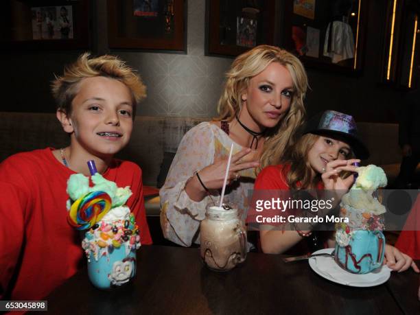 Britney Spears enjoys a family outing with Jayden Federline and Maddie Aldridge at Planet Hollywood Disney Springs on March 13, 2017 in Orlando,...