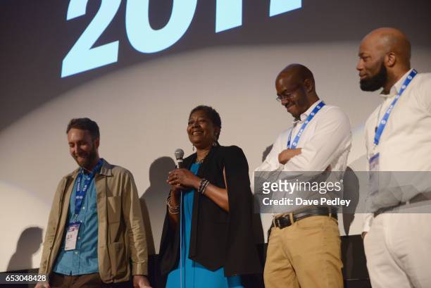 Director Erik Ljung, film subjects Maria Hamilton, Nate Hamilton and Dameion Peters speak onstage at the premiere of "The Blood Is at the Doorstep"...