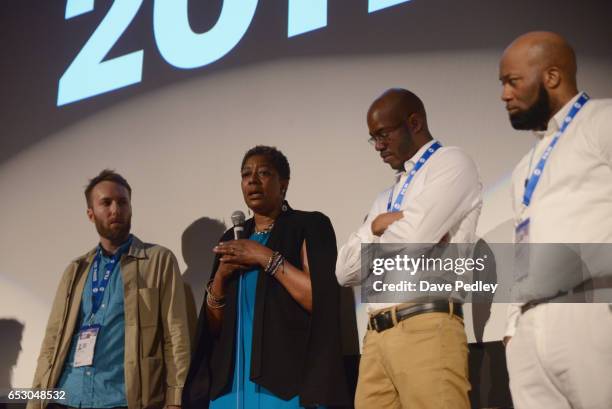 Director Erik Ljung, film subjects Maria Hamilton, Nate Hamilton and Dameion Peters speak onstage at the premiere of "The Blood Is at the Doorstep"...