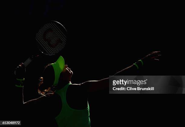 Lucie Safarova of the Czech Republic serves against Venus Williams of the United States in their third round match during day eight of the BNP...