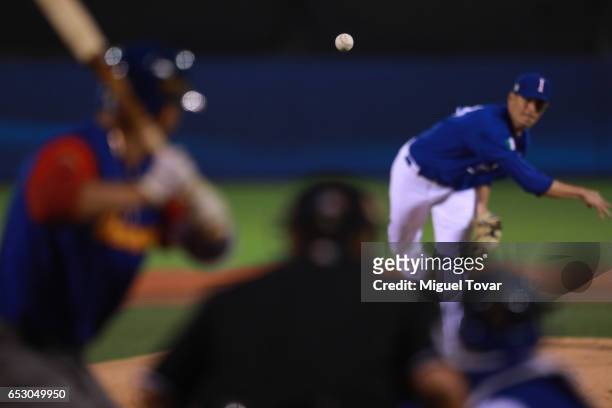 Morris of Italy pitches in the top of the first inning during the World Baseball Classic Pool D Game 7 between Venezuela and Italy at Panamericano...