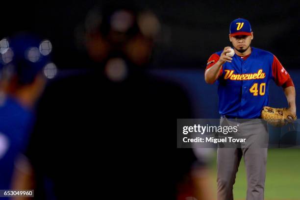 Omar Bencomo of Venezuela pitches in the bottom of the first inning during the World Baseball Classic Pool D Game 7 between Venezuela and Italy at...