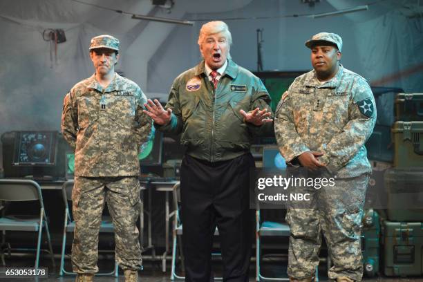 Scarlett Johansson" Episode 1720 -- Pictured: Alex Moffat, Alec Baldwin as President Donald Trump, and Kenan Thompson during the "Alien Attack" Cold...