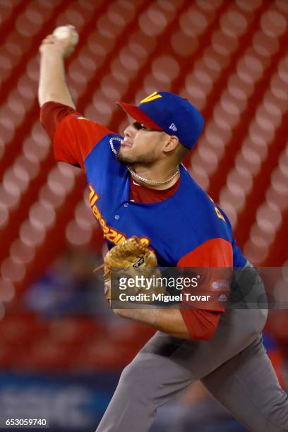 Omar Bencomo of Venezuela pitches in the bottom of the second inning during the World Baseball Classic Pool D Game 7 between Venezuela and Italy at...