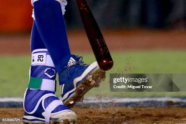 Francisco Cervelli of Italy removes sand from his shoes in the bottom of the fourth inning during the World Baseball Classic Pool D Game 7 between...