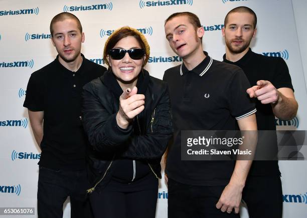 Jesse Bivona, Aimee Allen, Kevin Bivona and Justin Bivona of the ska punk band "The Interrupters" visit SiriusXM Studios on March 13, 2017 in New...