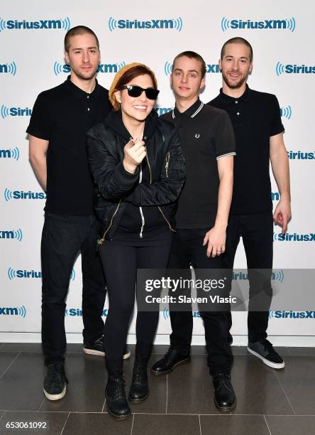 Jesse Bivona, Aimee Allen, Kevin Bivona and Justin Bivona of the ska punk band "The Interrupters" visit SiriusXM Studios on March 13, 2017 in New...