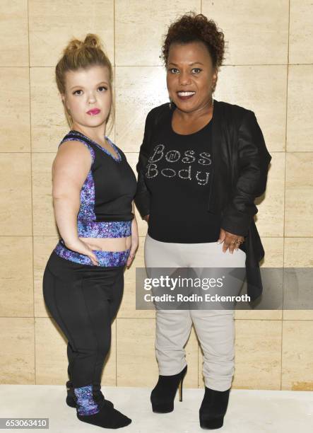 Model Autumn Gibel and actress/designer Tonya Renee Banks pose for portrait at Tonya Renee Banks' debut of "Lil Boss Body" clothing line at Fathom on...