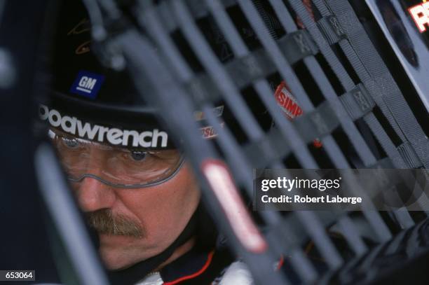 Driver Dale Earnhardt who drives the Chevrolet Monte Carlo for Richard Childress Racing focuses on the race during the Checker Auto Parts/Dura Lube...