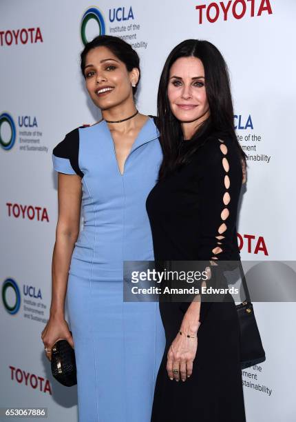 Actresses Freida Pinto and Courteney Cox arrive at the UCLA Institute of the Environment and Sustainability Innovators for a Healthy Planet...