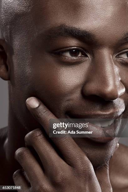 close up portrait of man - hand on chin stock pictures, royalty-free photos & images