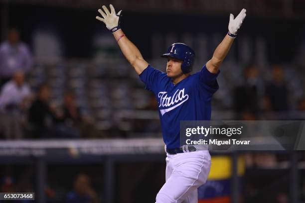 John Andreoli of Italy celebrates after hiting a home run in the bottom of the seventh inning during the World Baseball Classic Pool D Game 7 between...