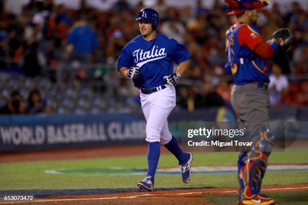 John Andreoli of Italy celebrates after hitting a home run in the bottom of the seventh inning during the World Baseball Classic Pool D Game 7...