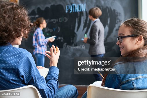 Discussing Lesson High-Res Stock Photo - Getty Images