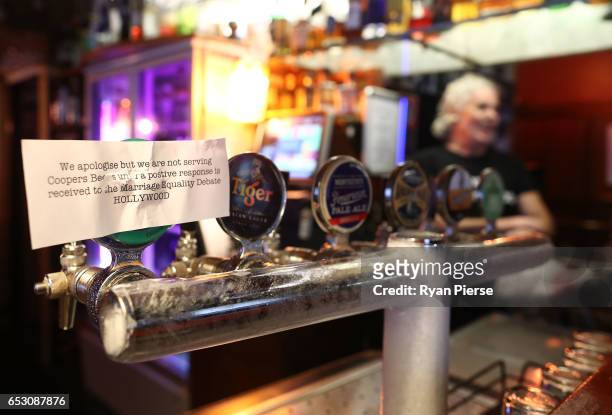 Sign is seen explaining why Coopers Beer is not being served at the Hollywood Hotel on March 14, 2017 in Sydney, Australia. The South Australian...
