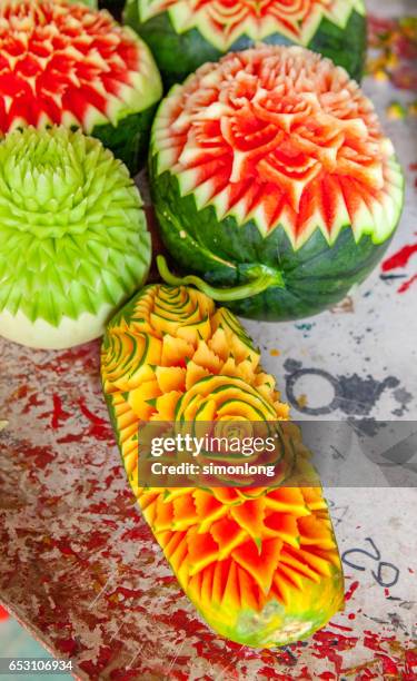 fruit carving in phuket, thailand - thai fruit carving stock pictures, royalty-free photos & images