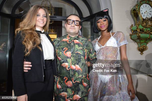 Presenter/comedian Cyrielle Joelle, designer William Arlotti and a model attends William Arlotti Show at Hotel Lancaster Hosted by Domaine de La...