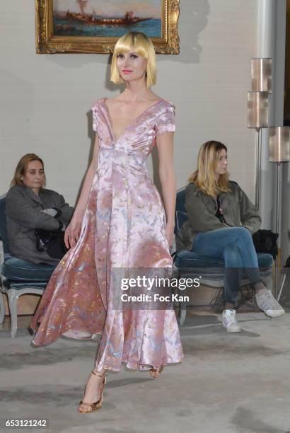 Model walks the runway during the William Arlotti Show at Hotel Lancaster Hosted by Domaine de La Croix wines on March 13, 2017 in Paris, France.