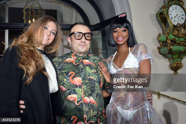 Presenter/comedian Cyrielle Joelle, designer William Arlotti and a model attends William Arlotti Show at Hotel Lancaster Hosted by Domaine de La...