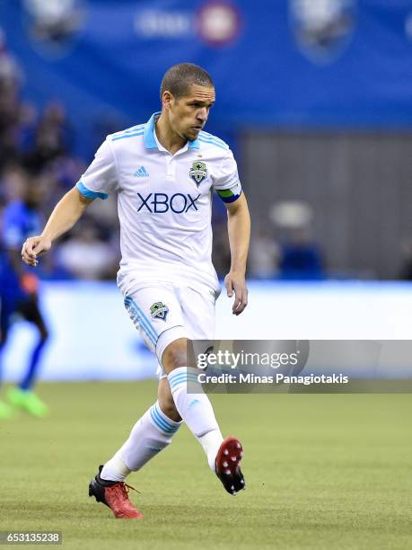 March 11: Osvaldo Alonso of the Seattle Sounders kicks during the MLS game against the Montreal Impact at Olympic Stadium on March 11, 2017 in...