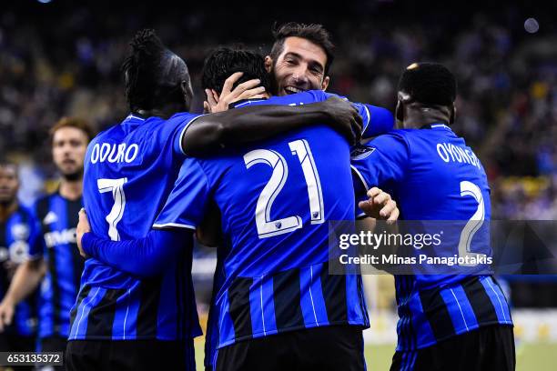 March 11: Matteo Mancosu of the Montreal Impact celebrates his goal with teammates during the MLS game against the Seattle Sounders FC at Olympic...