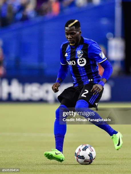 March 11: Ambroise Oyongo of the Montreal Impact controls the ball during the MLS game against the Seattle Sounders FC at Olympic Stadium on March...