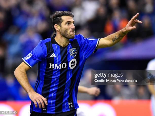 March 11: Ignacio Piatti of the Montreal Impact reacts after scoring a goal in the second half during the MLS game against the Seattle Sounders FC at...