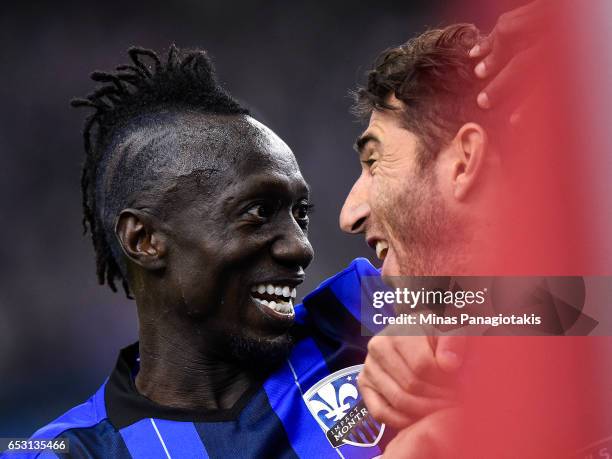 March 11: Dominic Oduro of the Montreal Impact celebrates a goal by Ignacio Piatti during the MLS game against the Seattle Sounders FC at Olympic...