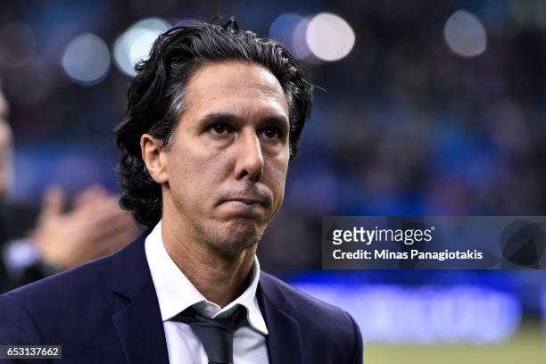 March 11: Head coach of the Montreal Impact Mauro Biello looks on during the MLS game against the Seattle Sounders FC at Olympic Stadium on March 11,...