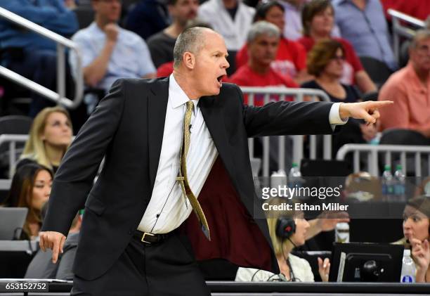 Head coach Tad Boyle of the Colorado Buffaloes reacts during a quarterfinal game of the Pac-12 Basketball Tournament against the Arizona Wildcats at...