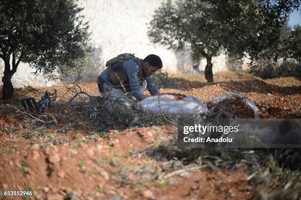 Free Syrian Army member defuses mines placed in the farms by Daesh terrorist, as soldiers continue to clean the al-Bab town of Aleppo from Daesh...
