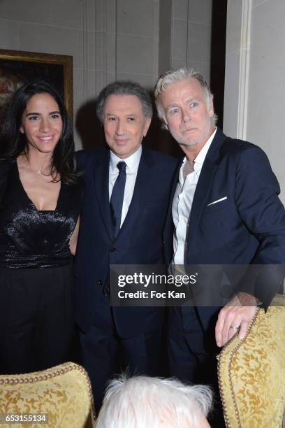 Daniele Dubosc, Michel Drucker and Franck Dubosc attend 'La Recherche en Physiologie' Charity Gala at Four Seasons Hotel George V on March 13, 2017...