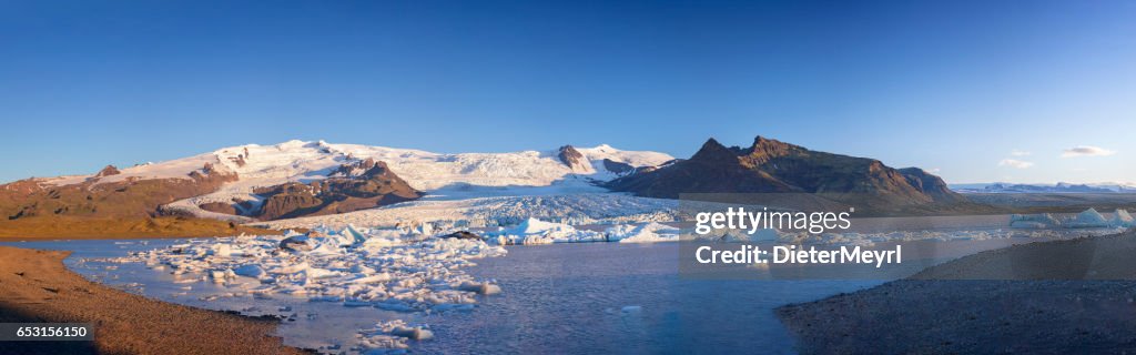 Great glacier lagoon in Iceland - Fjallsarlon at blue sky