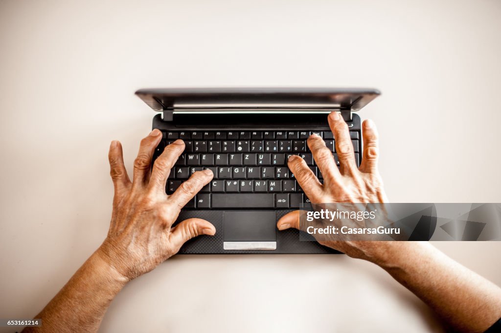 Close Up Senior Woman Old Hands Using Laptop