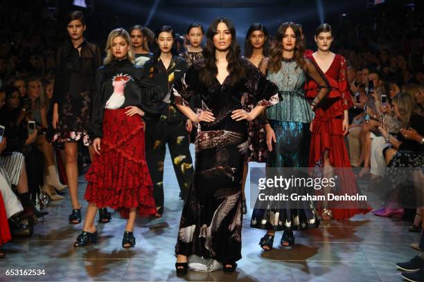Megan Irwin , Jessica Gomes and Jasinta Franklin pose on the runway during the David Jones Gala Runway Show at VAMFF on March 14, 2017 in Melbourne,...