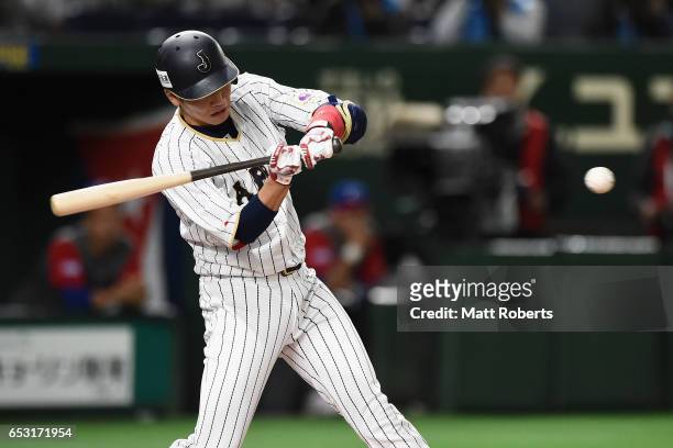 Infielder Hayato Sakamoto of Japan grounds out in the bottom of the first inning during the World Baseball Classic Pool E Game Four between Cuba and...