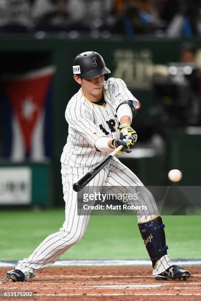 Catcher Seiji Kobayashi of Japan grounds out in the bottom of the second inning during the World Baseball Classic Pool E Game Four between Cuba and...