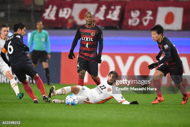 Thomas Broich of Brisbane and Ryota Nagaki of Kashima Antlers compete for the ball during the AFC Champions League Group E match between Kashima...