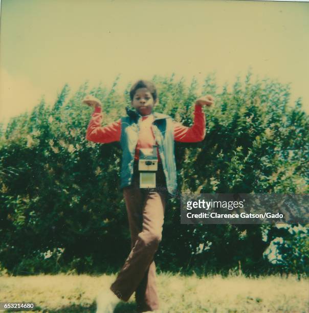 Polaroid photograph of a young African-American boy striking an Egyptian style pose, San Francisco, California, San Francisco, California, 1990. .