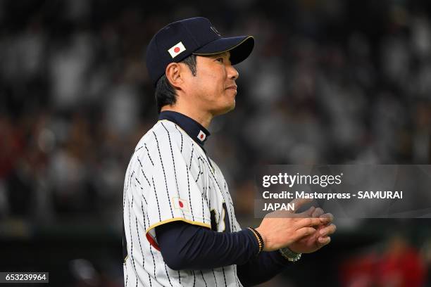 Manager Hiroki Kokubo of Japan celebrates his team's 5-8 victory after the World Baseball Classic Pool E Game Four between Cuba and Japan at the...