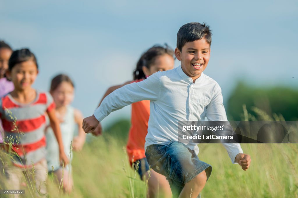 Running Through a Grassy Field