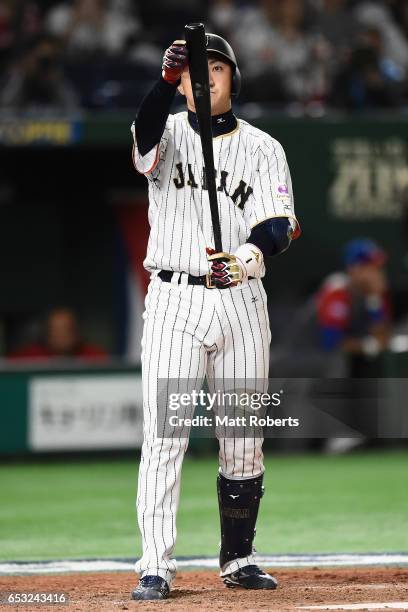 Pinch hitter Outfielder Seiichi Uchikawa of Japan prepares at bat in the bottom of the eighth inning during the World Baseball Classic Pool E Game...